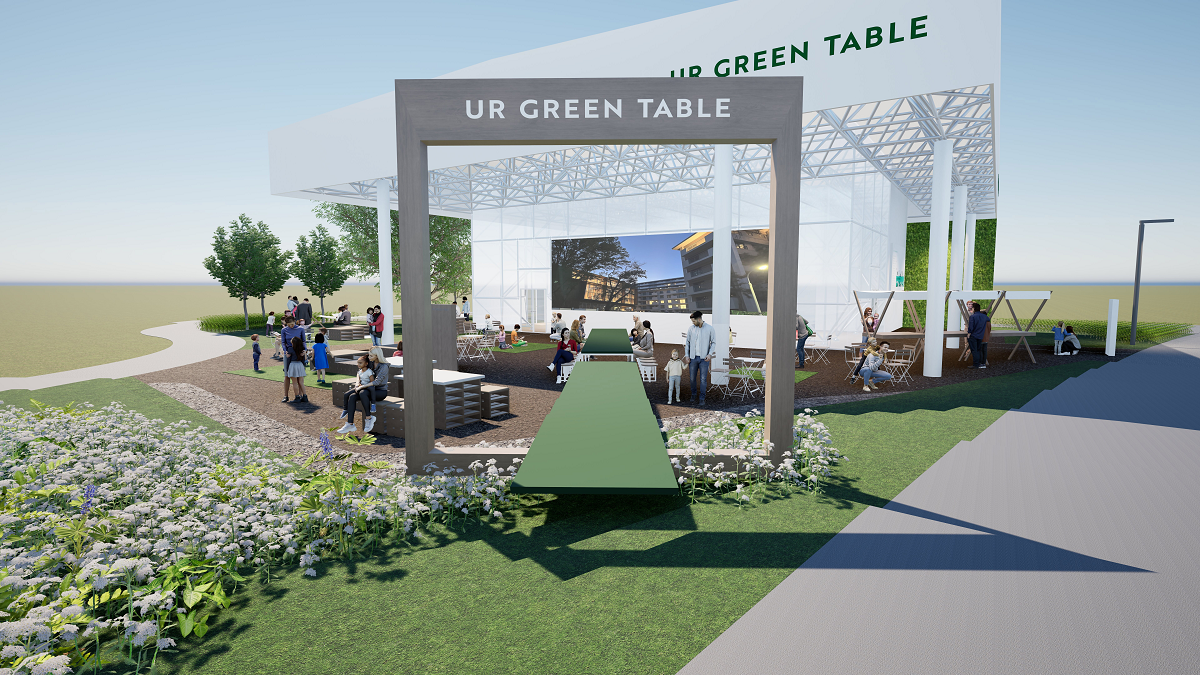 UR GREEN TABLEの入口から見た、屋根付きの半屋外広場で人々がくつろぐ様子を描いたイメージパース。周囲には植栽や休憩スペースが配置されている。